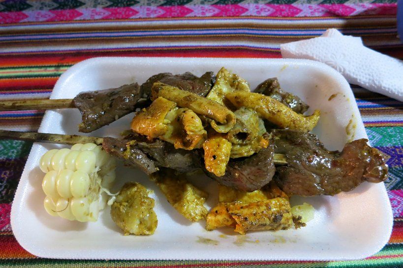 Rachi on top of anticuchos a Peruvian street food by Authentic Food Quest