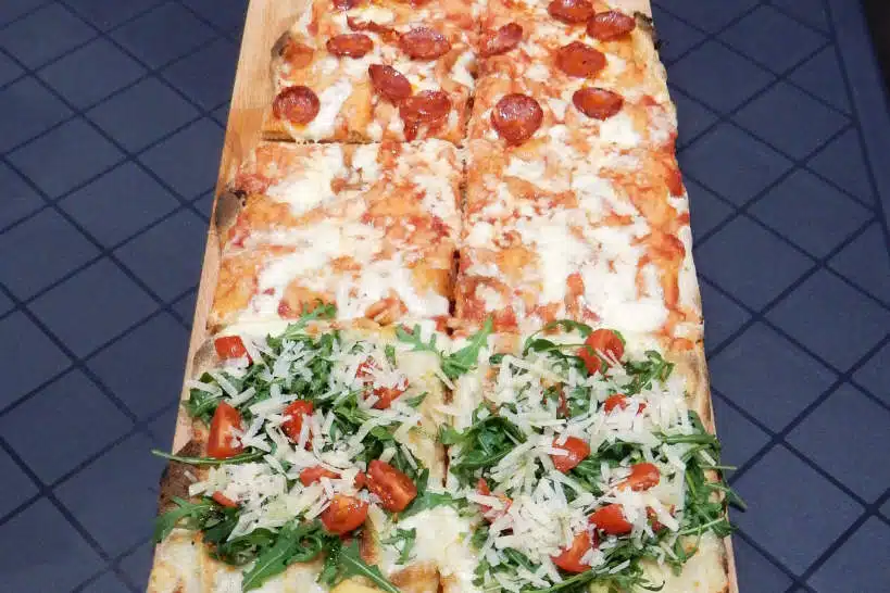 
Pizza a metro Montevideo Foods by Authentic Food Quest