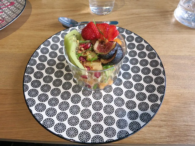 fruit salad at cinq lorette affordable restaurants in paris authentic food quest