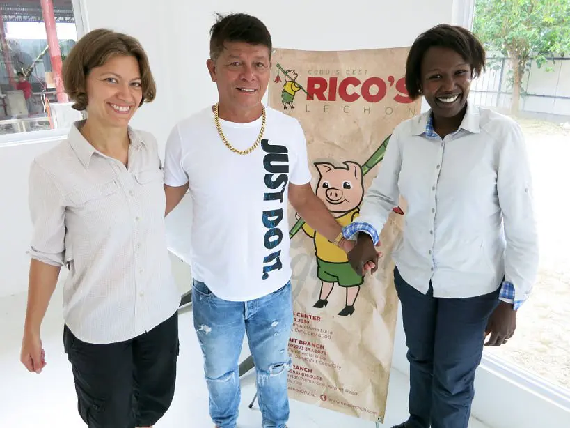 Claire and Rosemary with Rico Rico's lechon by Authentic Food Quest