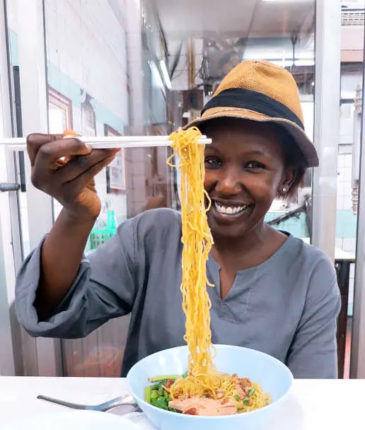 Rosemary eating Egg Noodle Bangkok food tour Authentic Food Quest