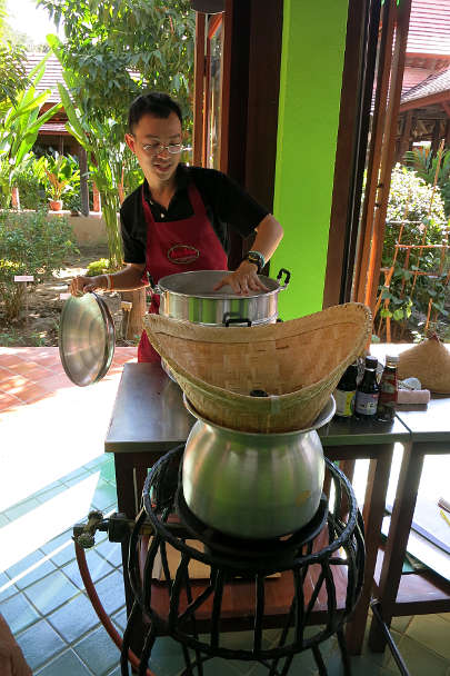 Chef O cooking Sticky Rice during our Chiang Mai Thai Cooking Class Authentic Food Quest