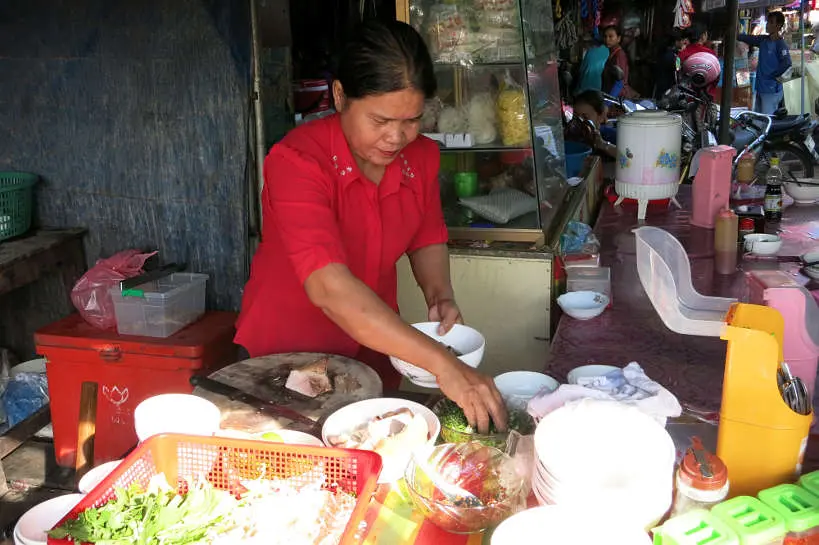 Lady foodstall Pho Langka Market Cambodian Cuisine Authentic Food Quest