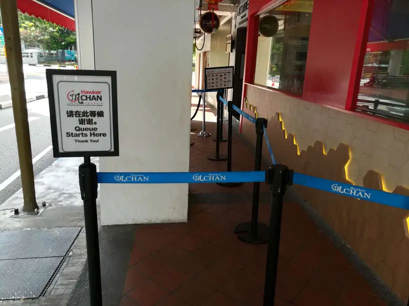 Hawker Chan Entrance with waiting line at Singapore Michelin Star Hawker Chan Singapore by Authentic Food Quest