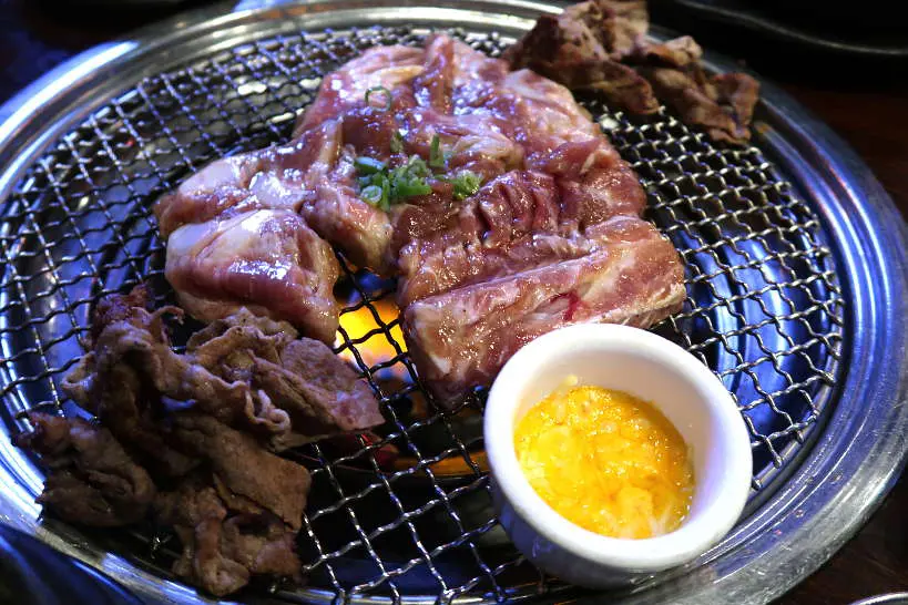 Hobak Best Korean BBQ in Vegas Pork Grilling_best affordable places to eat off the strip in Vegas by Authentic Food Quest. One of the best places to eat in Las Vegas for Korean food.