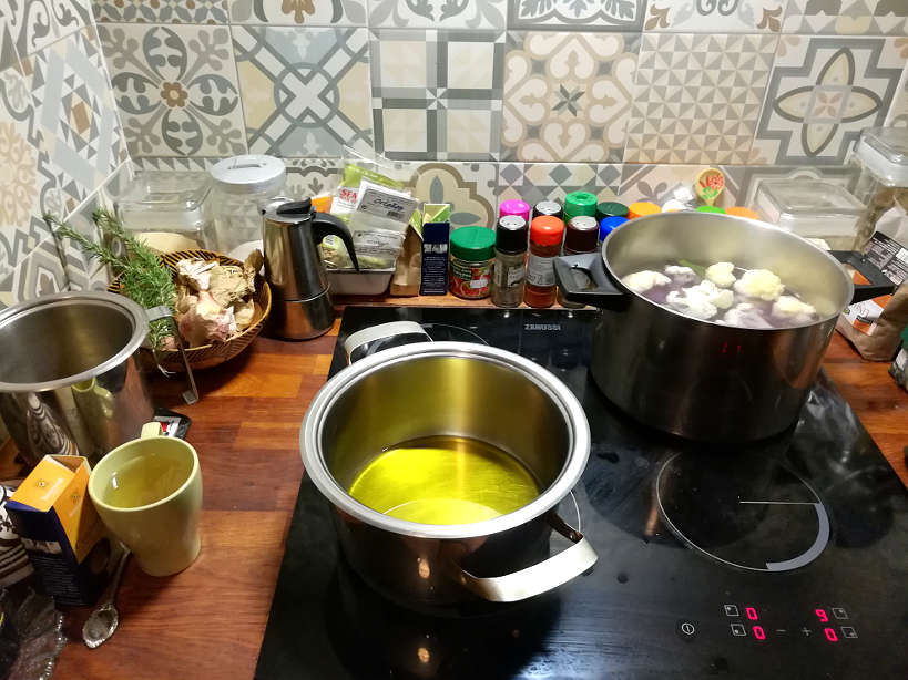 Cooking with Portuguese Oil for Portuguese foods for Portuguese Dinner and Eating with a Portuguese family and cooking class in Lisbonby Authentic Food Quest