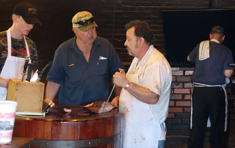 Cutting the Meat Smitty's Market Barbecue Best BBQ Lockhart by Authentic Food Quest