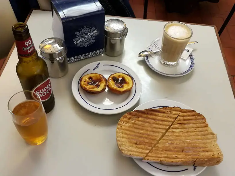 Pasteis de Belem with Tostadas for lisbon restaurants where locals eat the best lisbon food by Authentic Food Quest