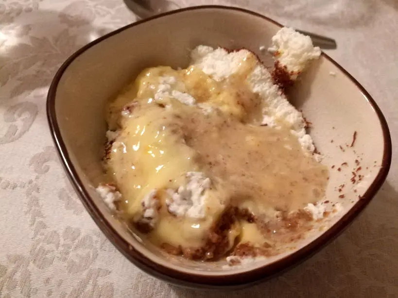 Picture of Traditional Portuguese Dessert called Bolo de Balacha or Biscuit Cake. This is a Traditional Portuguese food and the end to a Portuguese Dinner while Eating with a Portuguese family by Authentic Food Quest