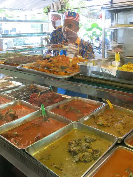 Buffet food in Malaysia use Travelan tot Prevent Travelers Diarrhea by Authentic Food Quest