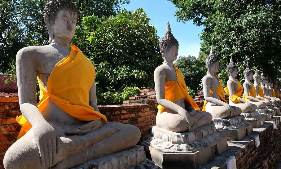 Wat Yai Chai Mongkhon Draped Buddha images on Ayutthaya Day Tour by Authentic Food Quest. Be sure to see these impressive Buddha images while visiting Ayutthaya temples