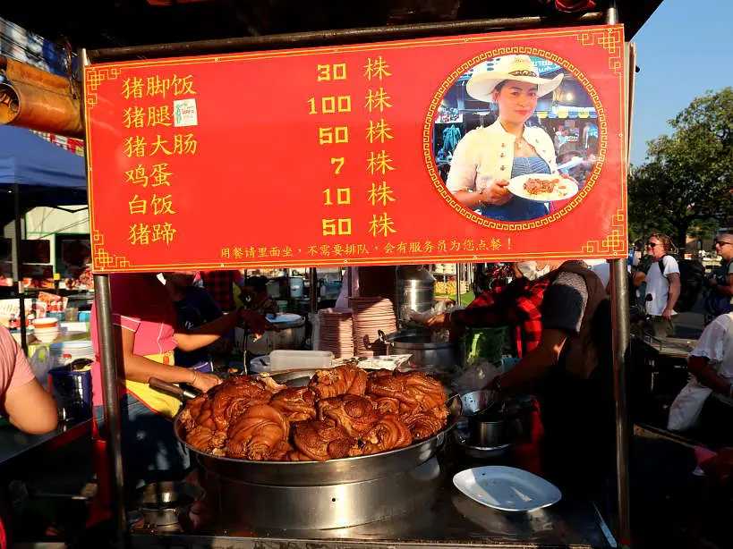 Cowboy Hat Lady Stall in Chiang Mai Street Food by Authentic Food Quest. One of the most delicious stalls at the Chiang Mai market