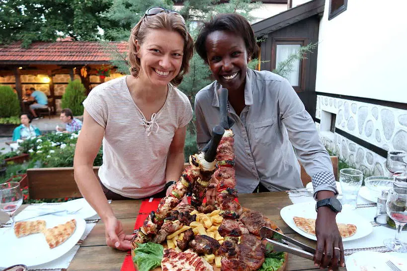 Claireand and Rosemary Eating Shaslik in Bansko by Authentic Food Quest