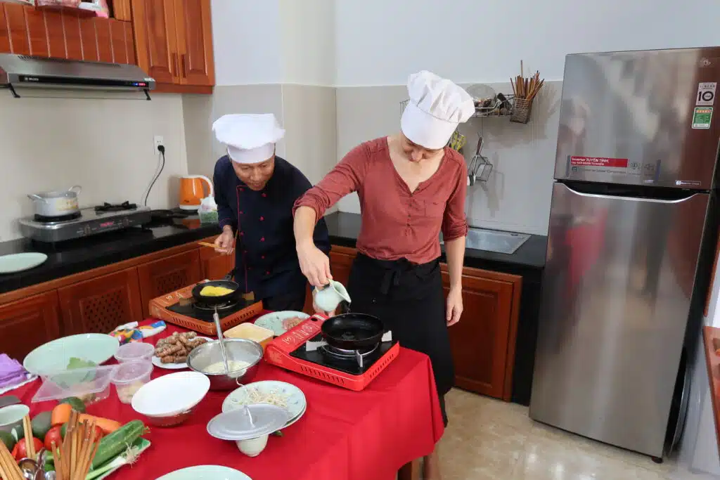 Preparing Meal Take Cooking Classes by Authentic Food Quest