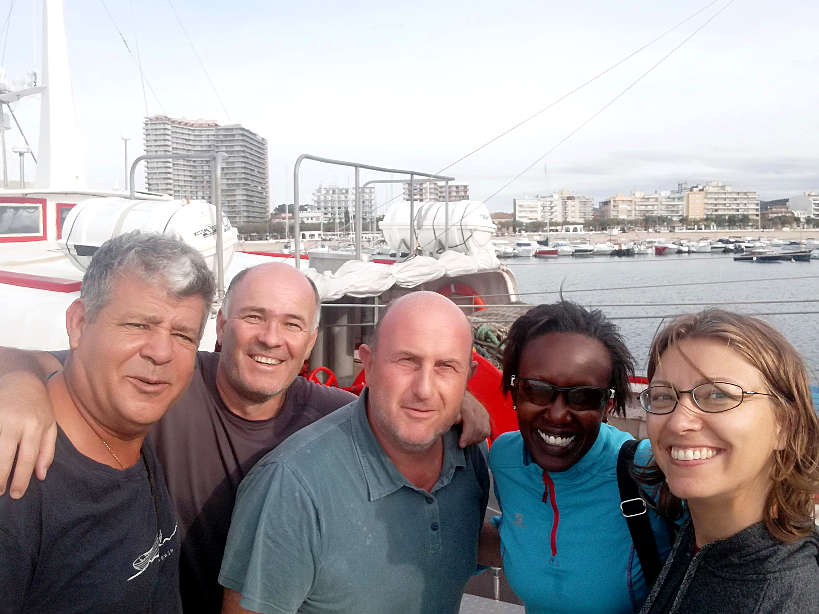 Rosemary and Claire with fishing crew Palamos Boat in Costa Brava Spain by AuthenticFoodQuest