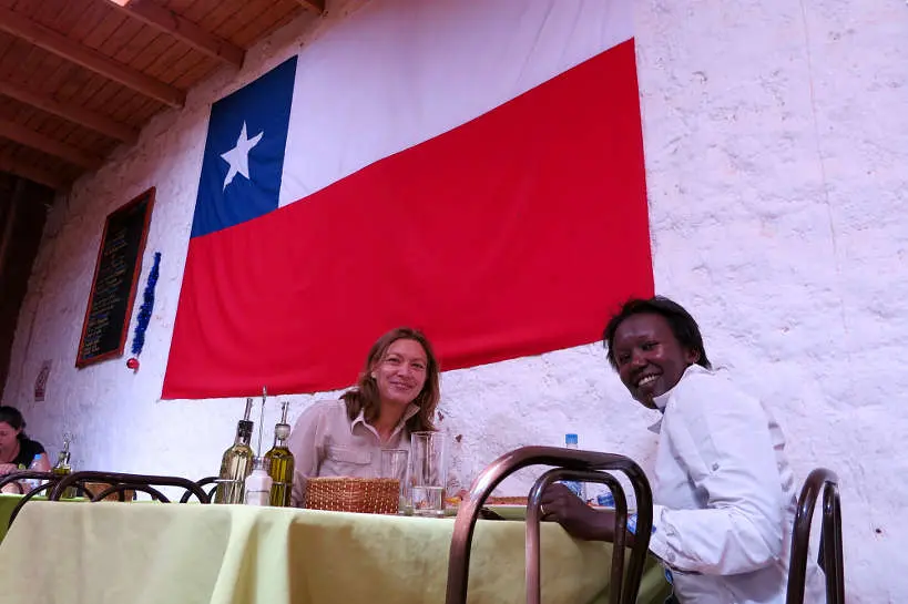 Claire and Rosemary eating pebre in Chile by Authentic Food Quest