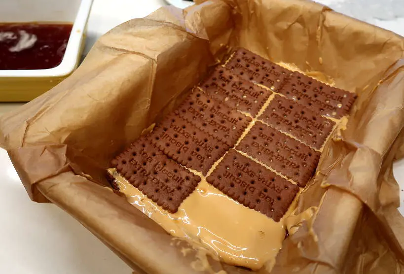 Layer chocolate cookies for chocotorta Argentina recipe by Authentic food quest