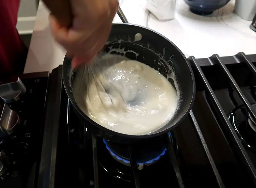 Coconut Sauce cooking for Che Ba Mau Recipe by AuthenticFoodQuest