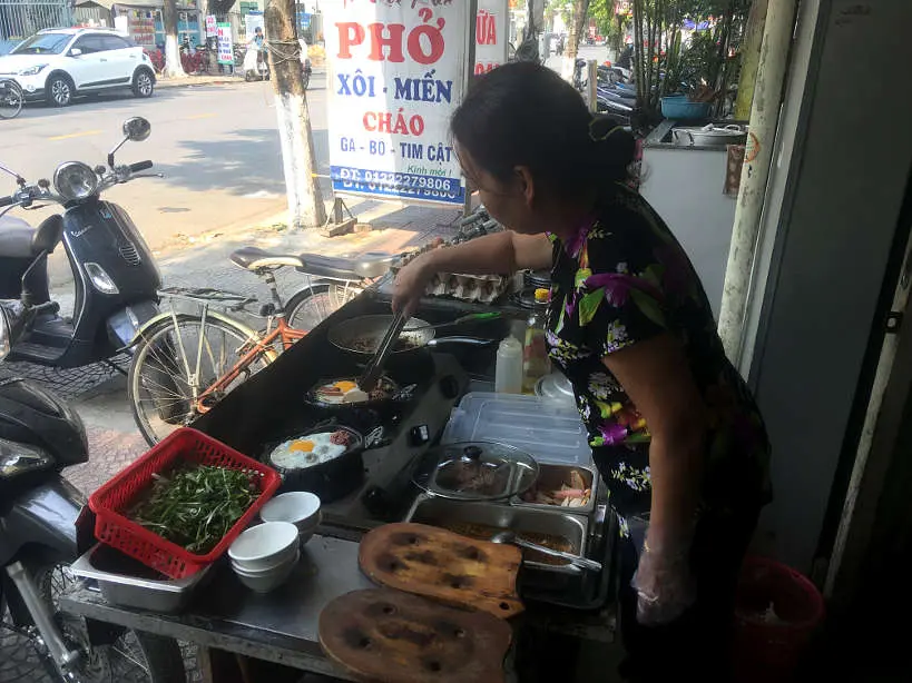Lady Preparing Bo Ne Danang Breakfast by AuthenticFoodQuest