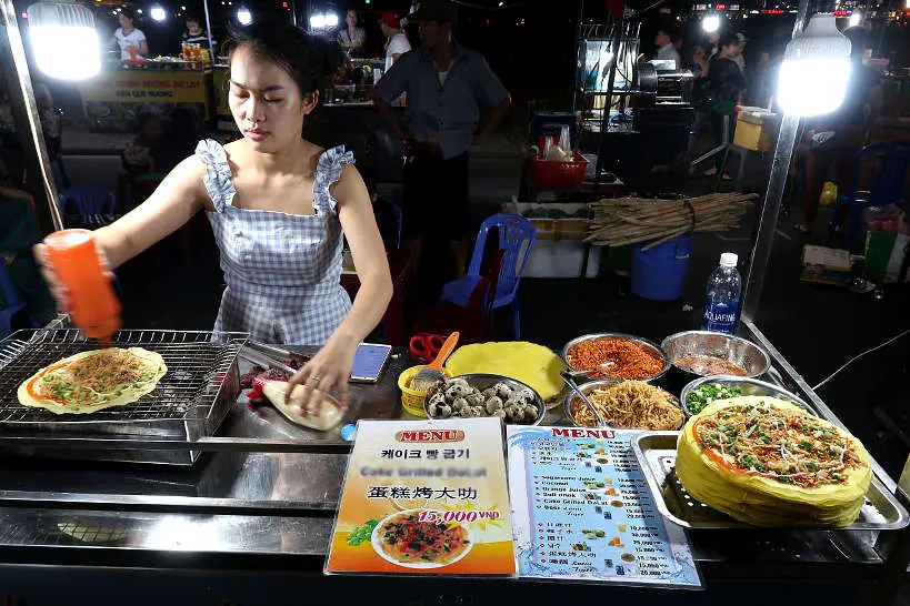 Banh Trang Trung street vendor in Hue by Authentic Food Quest