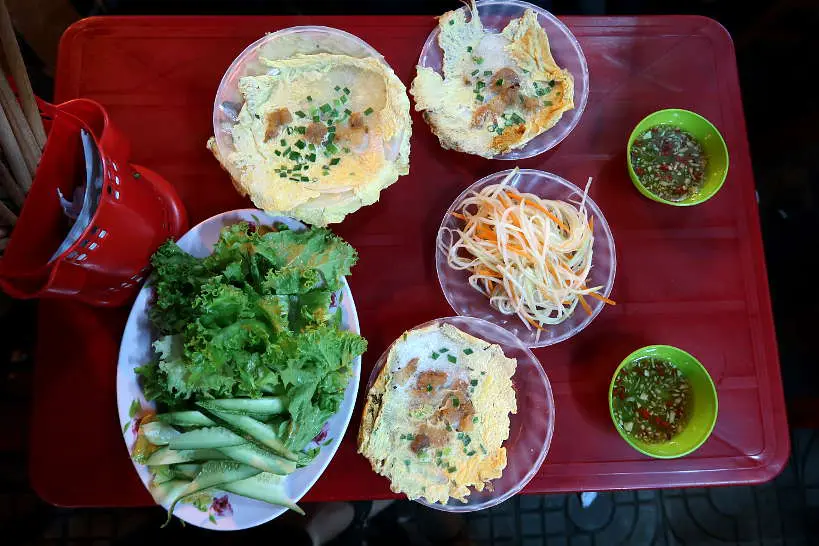 Eating Banh Ep Hue Food by Authentic Food Quest