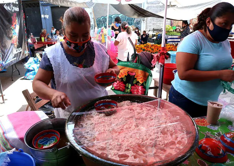 Tejate stand at tianguis on Saturday in Oaxaca, Mexico by Authentic Food Quest