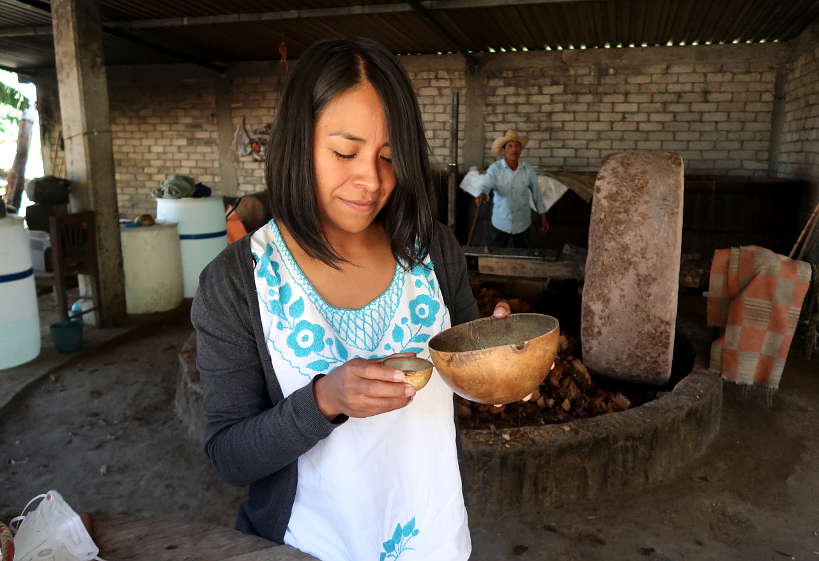 Daniela tasting mezcal on Oaxaca Mezcal Tour by Authentic Food Quest