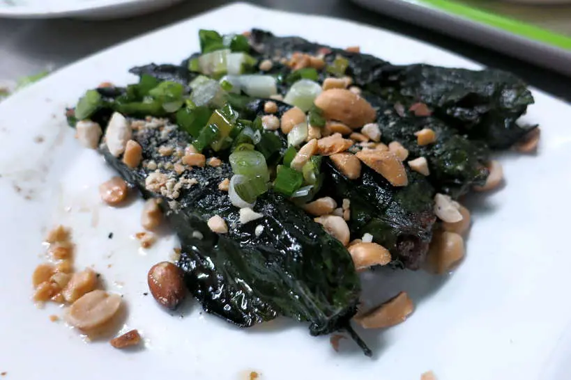 Bo la lot grilled beef and betel leaves for food in Saigon by Authentic Food Quest