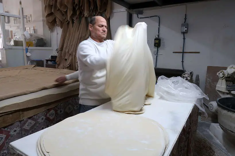 Making phyllo dough for bougatsa stelios chania Crete by Authentic Food Quest