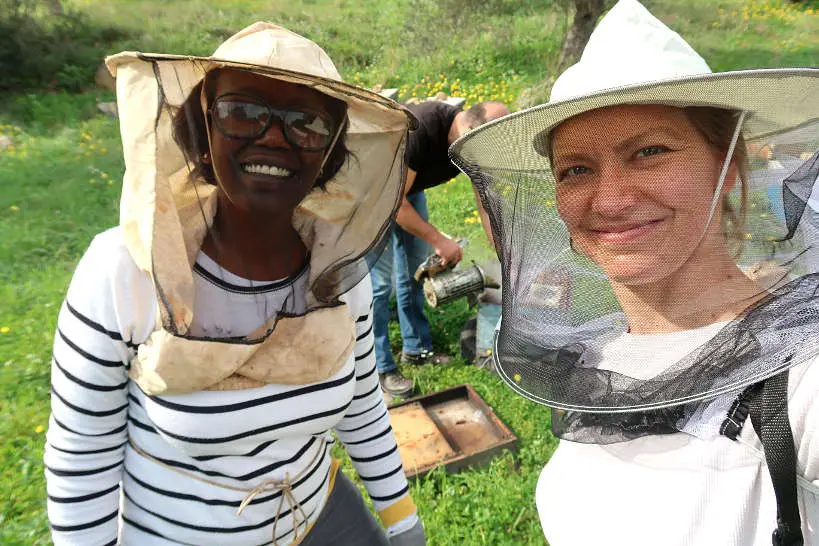 Rosemary and Claire leanring about Cretan honey and beekeeping by Authentic Food Quest