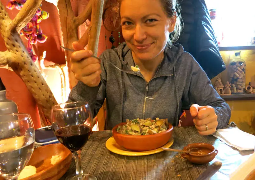 Claire Eating Cazuela de Llama by AuthenticFoodQuest