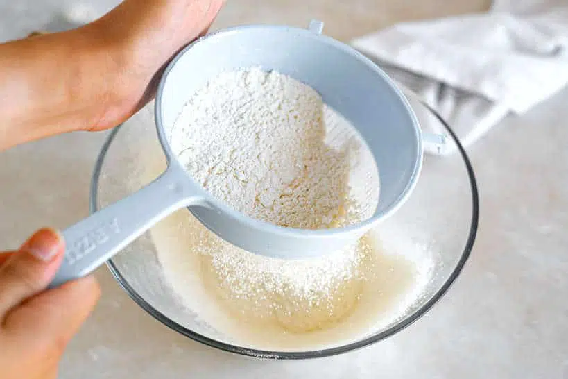 Sifting Flour for Pao de Lo Recipe by Authentic Food Quest