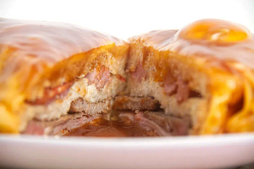 Sandwich Francesinha cut in half by Authentic Food Quest