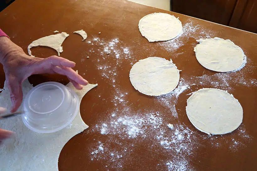 Cutting the Kalitsounia dough by Authentic Food Quest