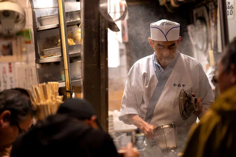 Tokyo Japan Chef cooking street food by Authentic Food Quest