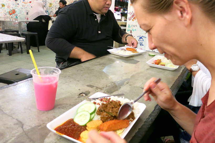 Claire eating Nasi Lemak with Bandung in Singapore by Authentic Food Quest