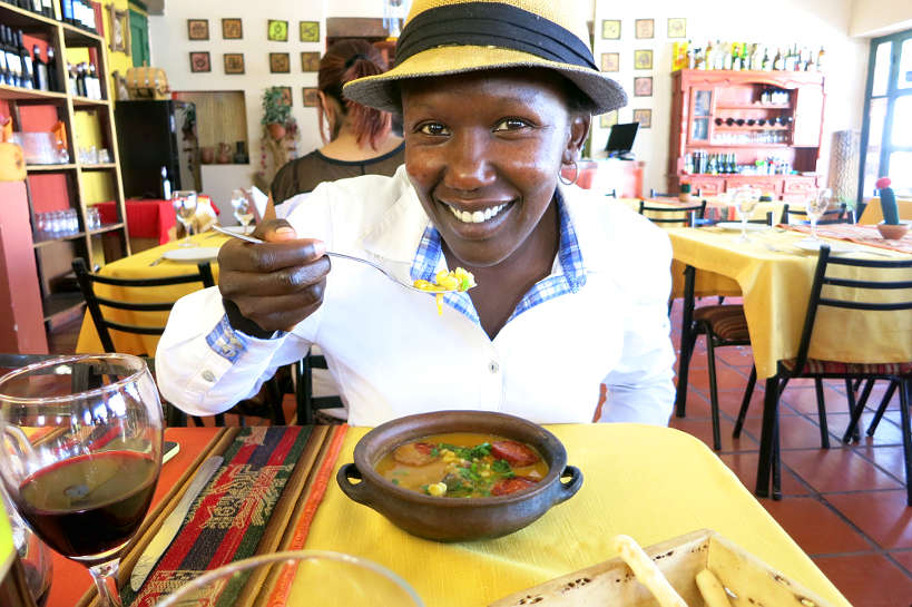 Rosemary Eating Locro Salta Argentina by Authentic Food Quest
