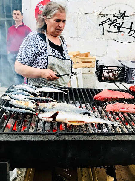 Grilling on the Street at O Caldo Verde Restaurant in Lisbon by Authentic Food Quest