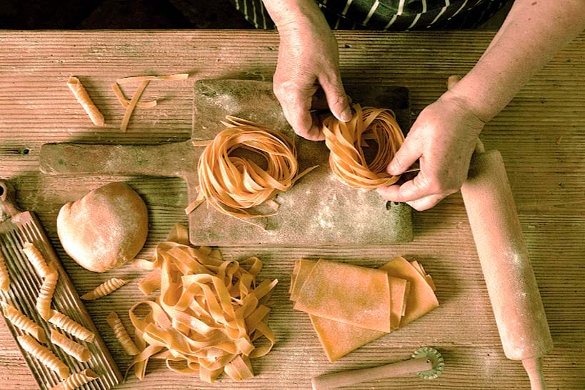 Making pasta Culinary Tour Italy by Authentic Food Quest