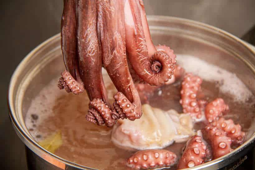 boiling octopus Polvo Lagareiro by Authentic Food Quest
