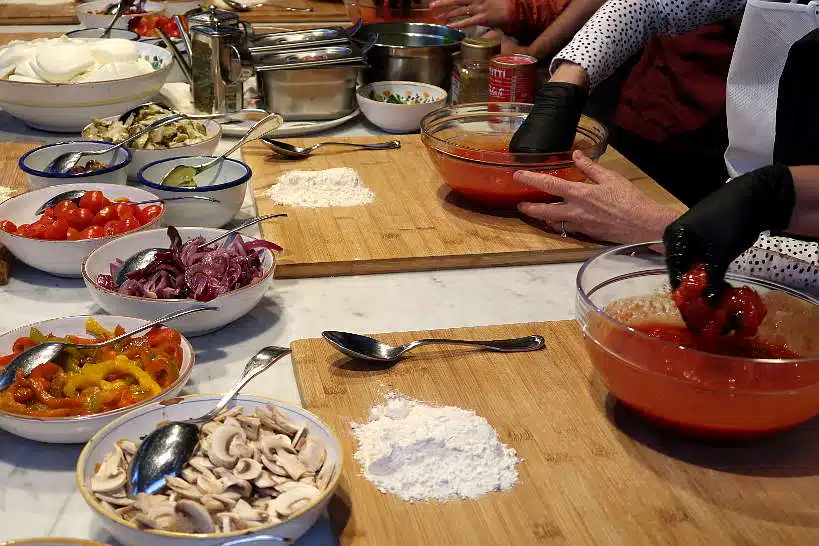 Making Tomato sauce for Pizza Florence Cooking Class by AuthenticFoodQuest